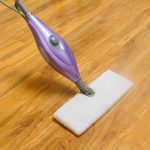 Using a steam mop on laminate floor.