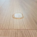 Water on laminate flooring.