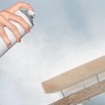 Using a spray clear coat for wood.