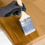 Painting a kitchen countertop.