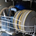 Removing rust from a dishwasher rack.
