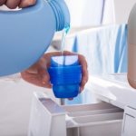 Mixing bleach and laundry detergent.