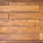 There are several possible causes for the development of small white spots on your wood flooring.