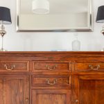 The perfect height for hanging a mirror over a dresser.