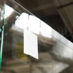 Removing scratches from tempered glass.