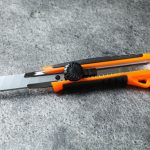 Orange utility knife.