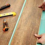 Guide on how to cut your laminate flooring using a utility knife.